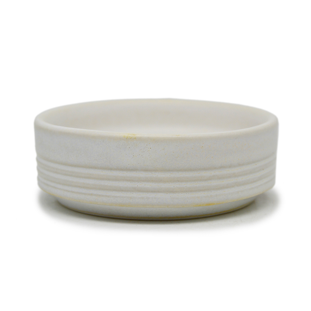 Tiny round soap dish